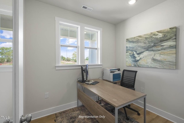 office space with visible vents, baseboards, wood finished floors, and recessed lighting