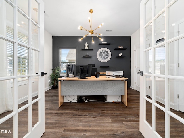 office space with french doors, dark wood-style flooring, and a healthy amount of sunlight