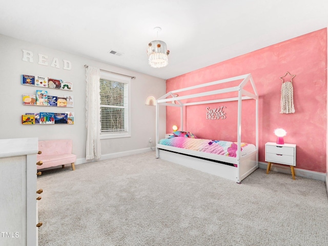 bedroom with an inviting chandelier, carpet flooring, baseboards, and visible vents