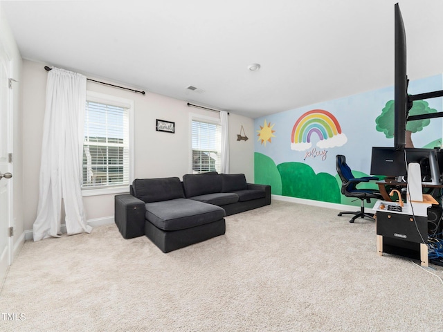 living area featuring carpet flooring, baseboards, and visible vents