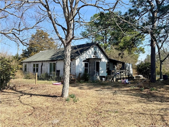 view of property exterior with concrete block siding