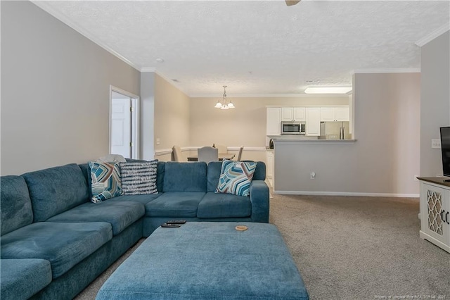 carpeted living area featuring a textured ceiling, baseboards, a chandelier, and crown molding