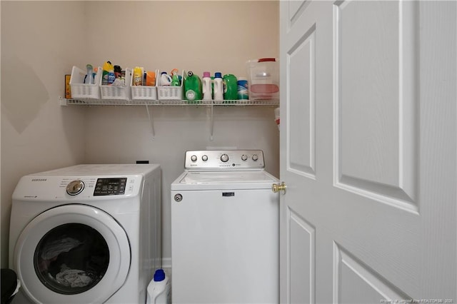 washroom with laundry area and washing machine and clothes dryer