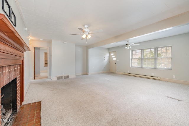 unfurnished living room featuring a baseboard heating unit, a brick fireplace, carpet floors, and visible vents