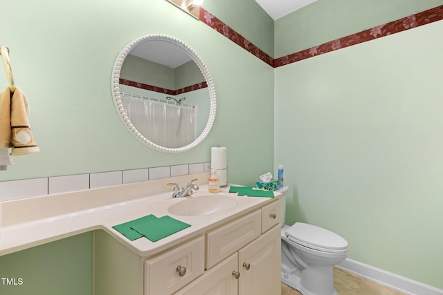 bathroom featuring tile patterned floors, a shower with curtain, toilet, and vanity