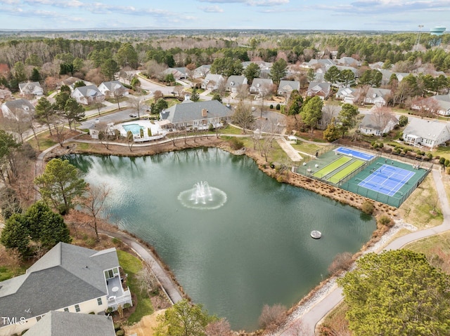 bird's eye view with a residential view and a water view