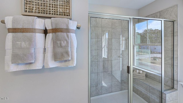 full bathroom featuring a stall shower