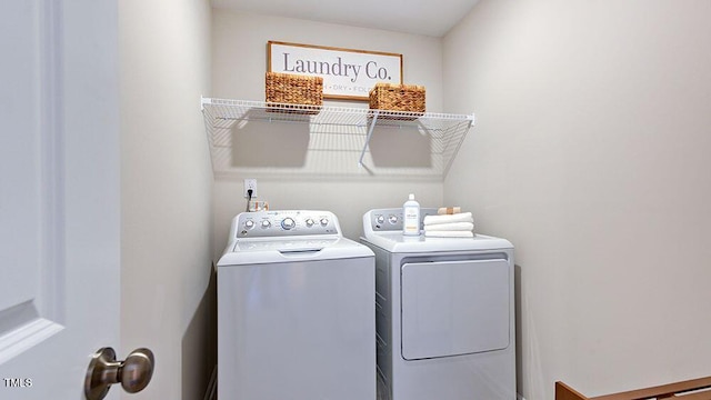 laundry area featuring laundry area and washing machine and dryer