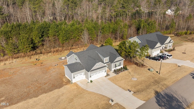 aerial view featuring a forest view