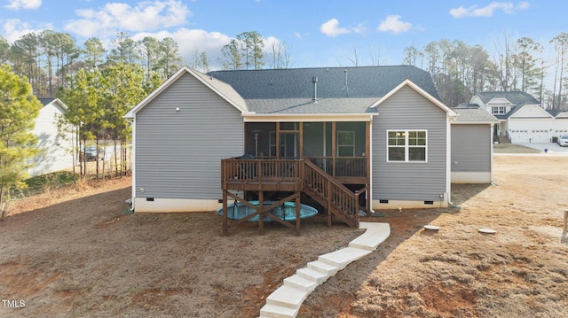 back of house featuring stairs, a shingled roof, crawl space, and a sunroom