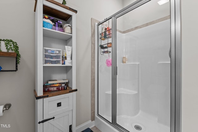 bathroom with a stall shower