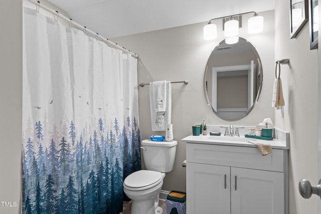 full bath featuring toilet, a shower with curtain, and vanity