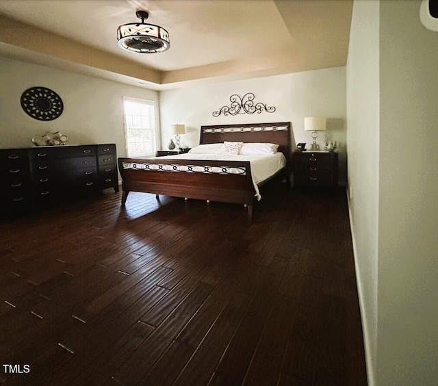 bedroom featuring hardwood / wood-style flooring