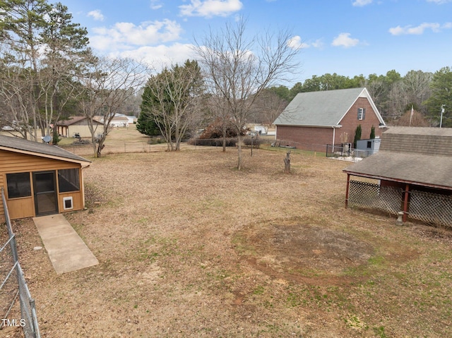 view of yard with fence