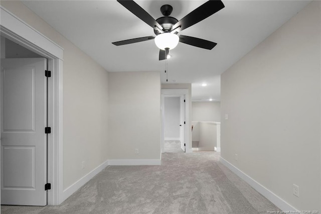 interior space with carpet floors and baseboards