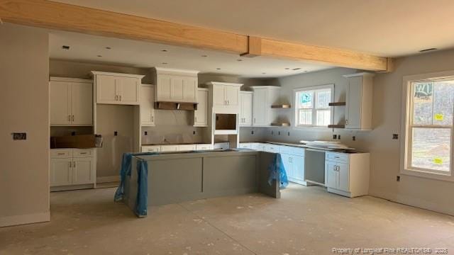 kitchen featuring white cabinets, beam ceiling, a center island, dishwasher, and open shelves