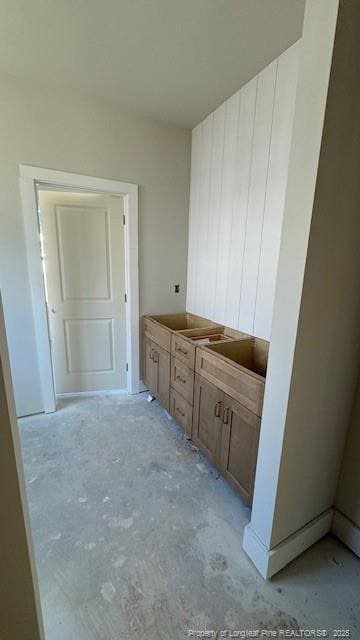 bathroom featuring concrete flooring