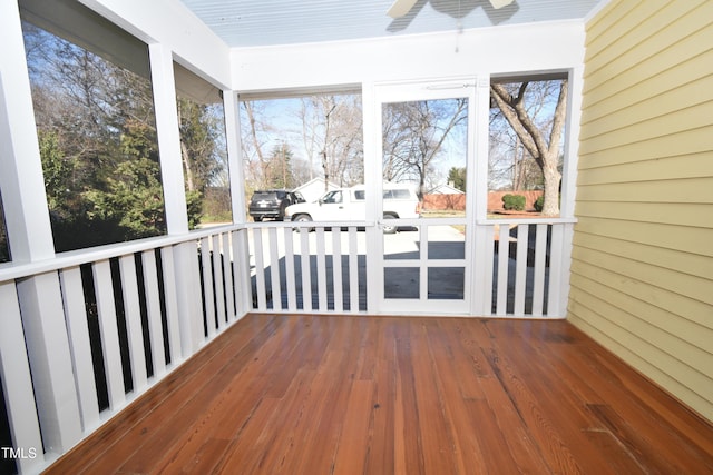 unfurnished sunroom with a wealth of natural light