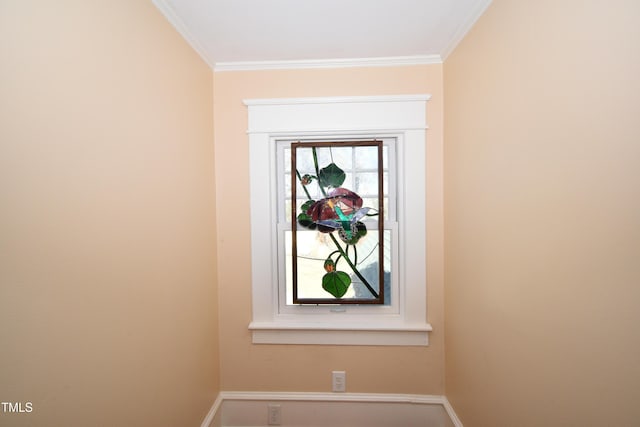 room details featuring baseboards and ornamental molding