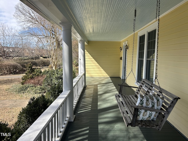 balcony featuring a porch