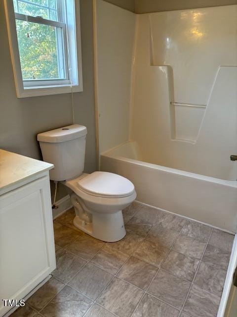 full bath with toilet, shower / bathing tub combination, and vanity