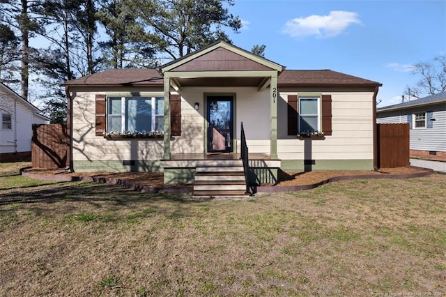 bungalow with a front lawn and crawl space