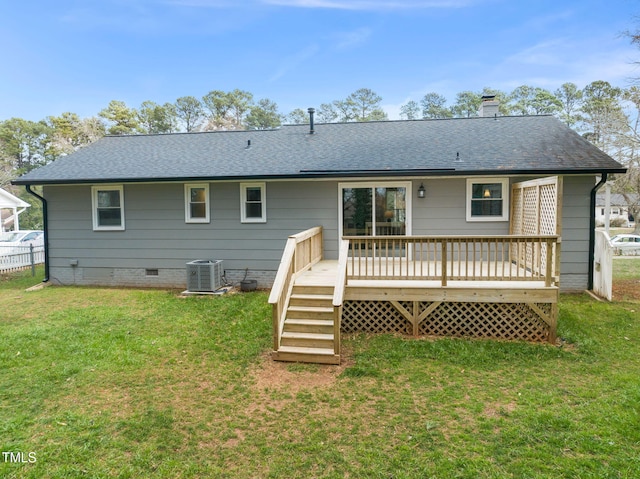 back of house with a deck, cooling unit, fence, crawl space, and a lawn