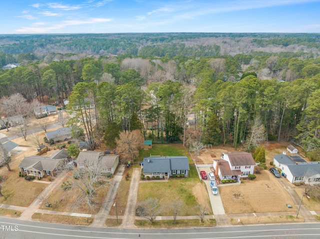 aerial view featuring a forest view