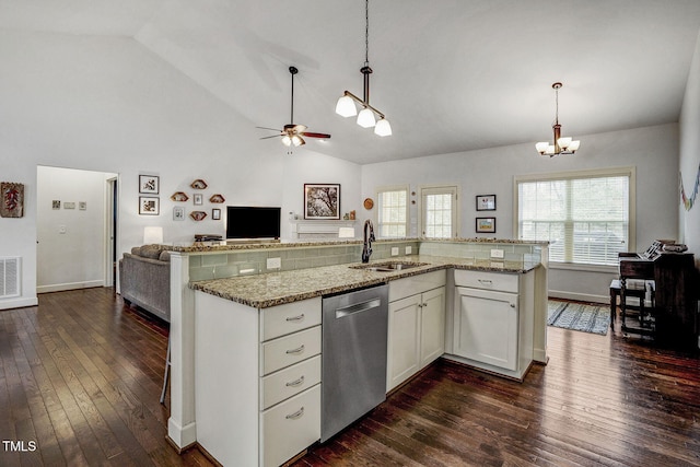 kitchen with dark wood-style floors, open floor plan, a sink, and stainless steel dishwasher