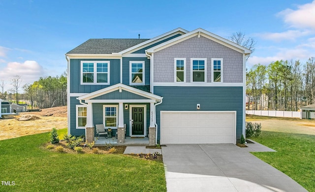 509 Marthas View Way, Wake Forest, NC 27587 - craftsman-style house with an attached garage, concrete driveway, a front yard, and a porch