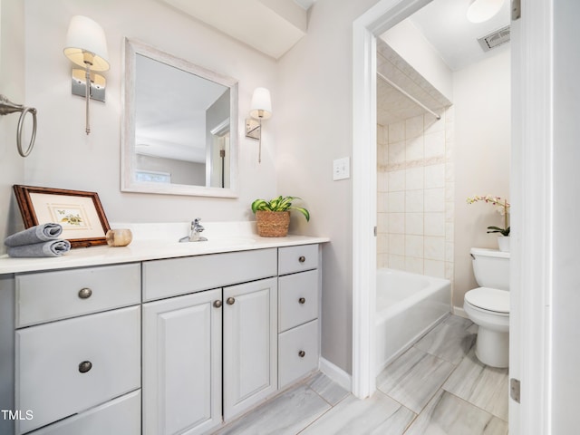 full bath featuring visible vents, baseboards, toilet, shower / tub combination, and vanity