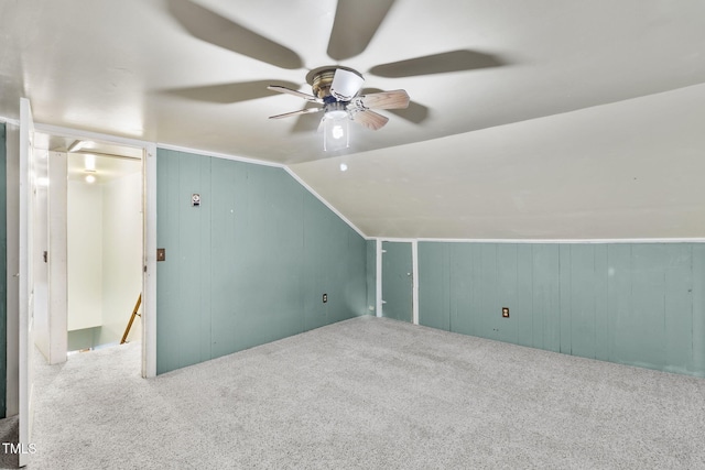 bonus room featuring vaulted ceiling, ceiling fan, and carpet flooring