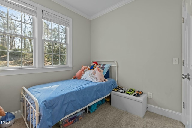 bedroom featuring baseboards, carpet, and ornamental molding