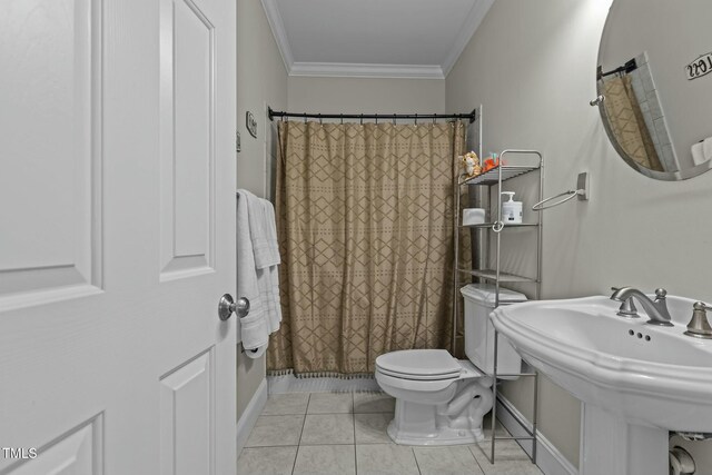 full bathroom featuring a shower with curtain, a sink, ornamental molding, tile patterned floors, and toilet