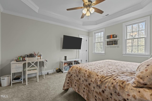 carpeted bedroom featuring visible vents, ceiling fan, crown molding, and baseboards