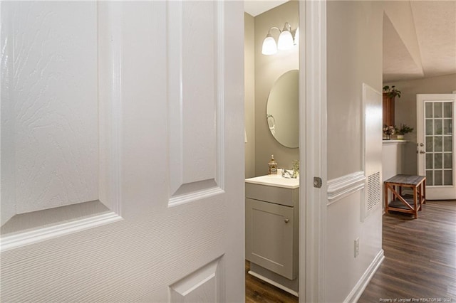 hall featuring dark wood finished floors