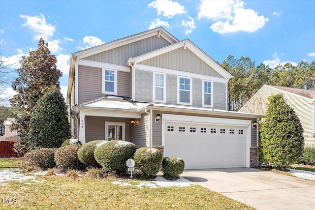 view of front facade with driveway and an attached garage