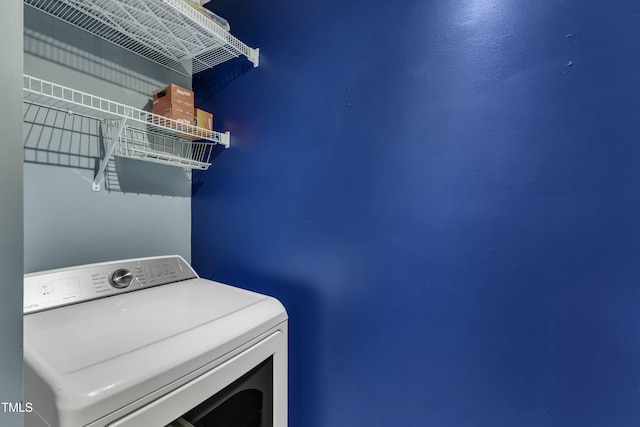 laundry area with washer / dryer and laundry area