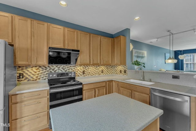 kitchen featuring a sink, stainless steel appliances, light countertops, light brown cabinets, and backsplash