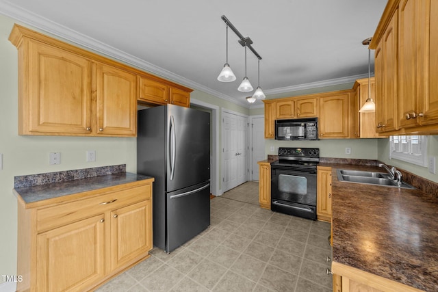 kitchen with dark countertops, a sink, and black appliances