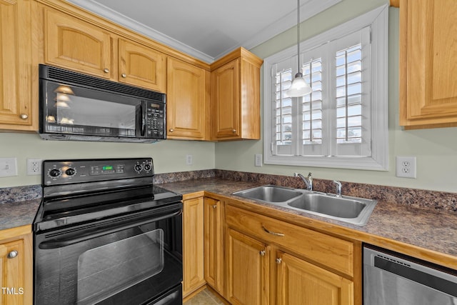 kitchen featuring dark countertops, decorative light fixtures, a sink, and black appliances