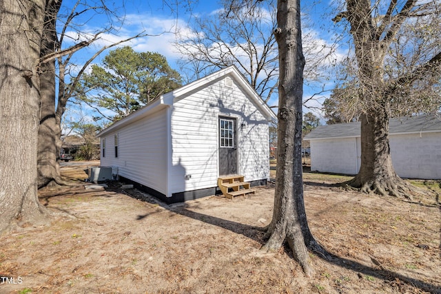 view of outbuilding with entry steps and an outbuilding