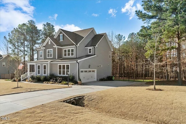 view of front of property with driveway and an attached garage