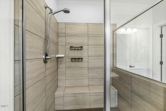 full bathroom featuring a shower stall