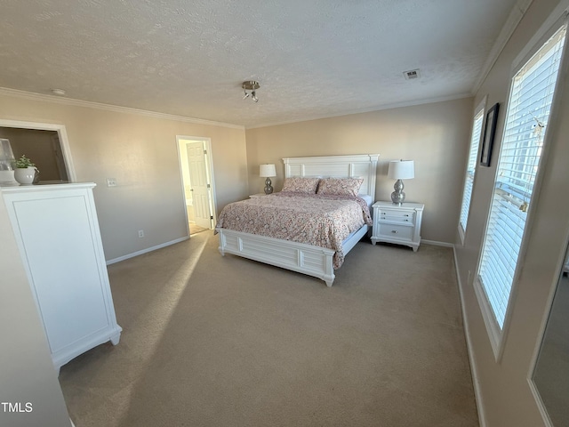 carpeted bedroom with baseboards, a textured ceiling, visible vents, and crown molding