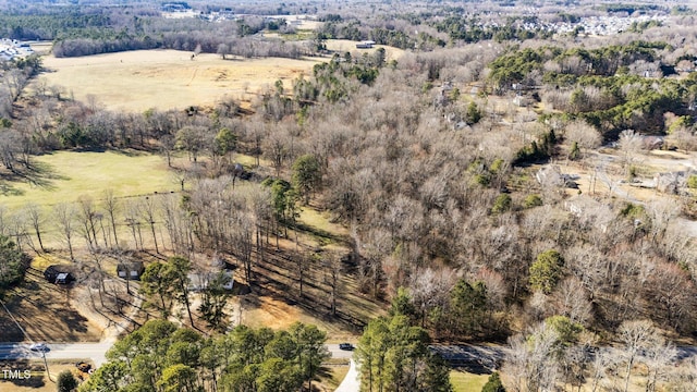 birds eye view of property with a rural view