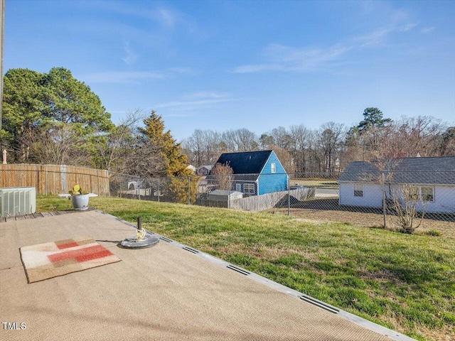 view of yard featuring a patio area and a fenced backyard