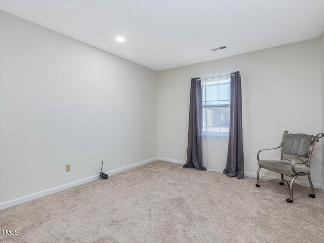 unfurnished room featuring visible vents, baseboards, carpet floors, recessed lighting, and a textured ceiling