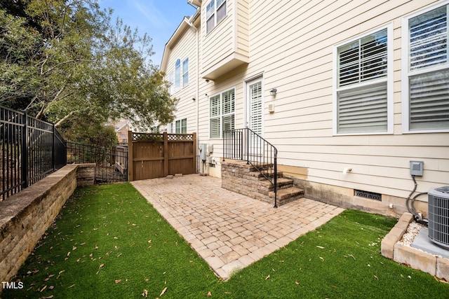 view of patio featuring cooling unit and a fenced backyard