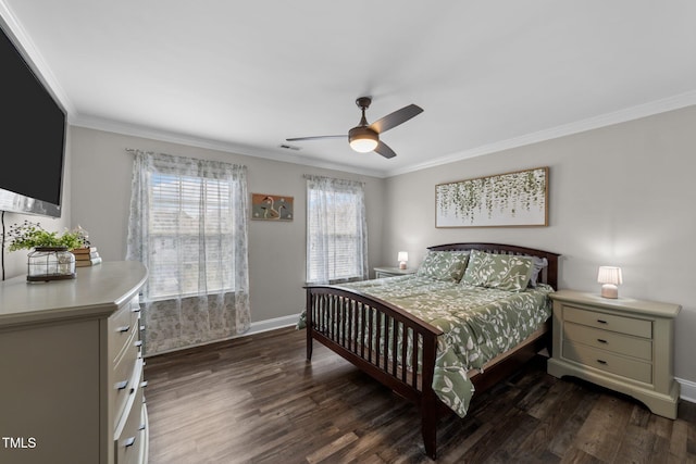 bedroom with dark wood finished floors, crown molding, baseboards, and ceiling fan